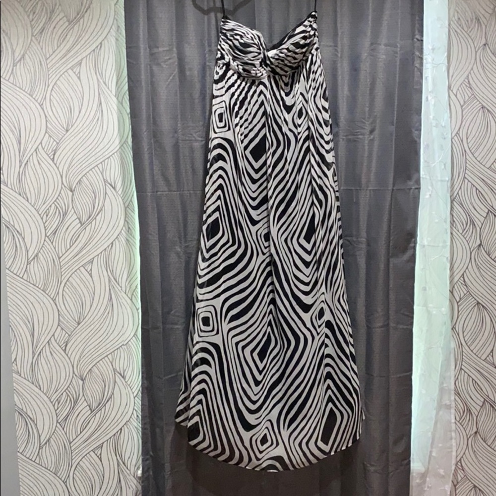 Zebra print strapless dress w/ black lining.